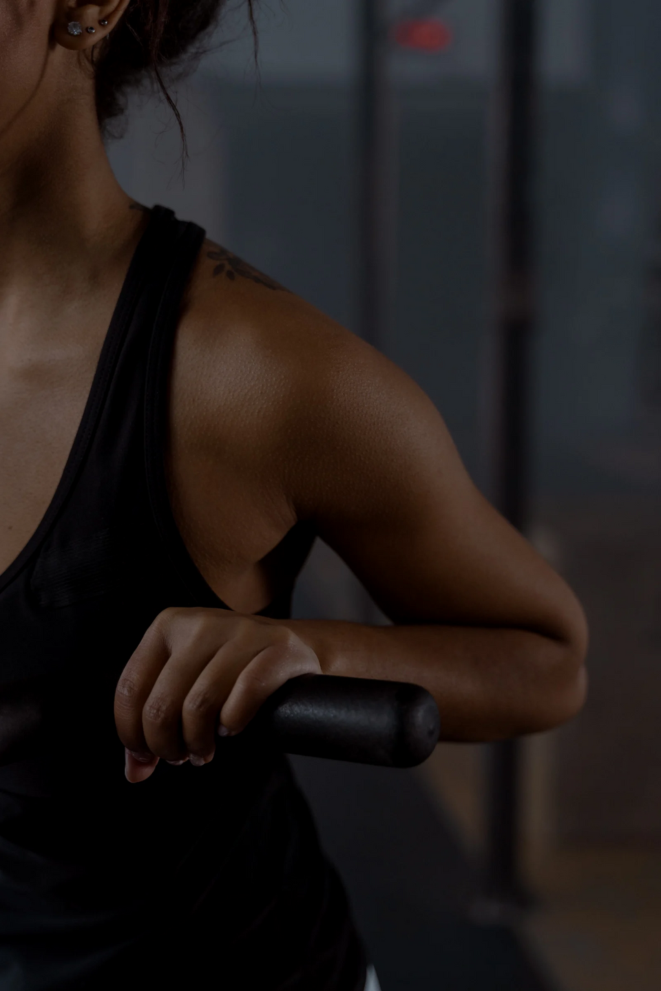 a close-up of a woman's biceps while working out